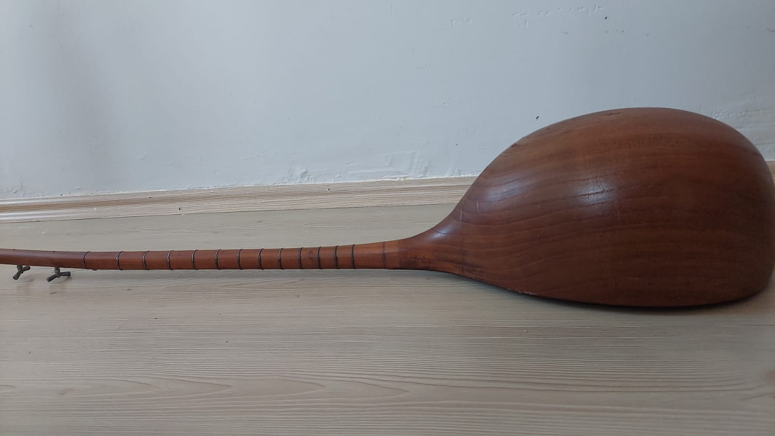 Turkmen dutar musician playing instrument