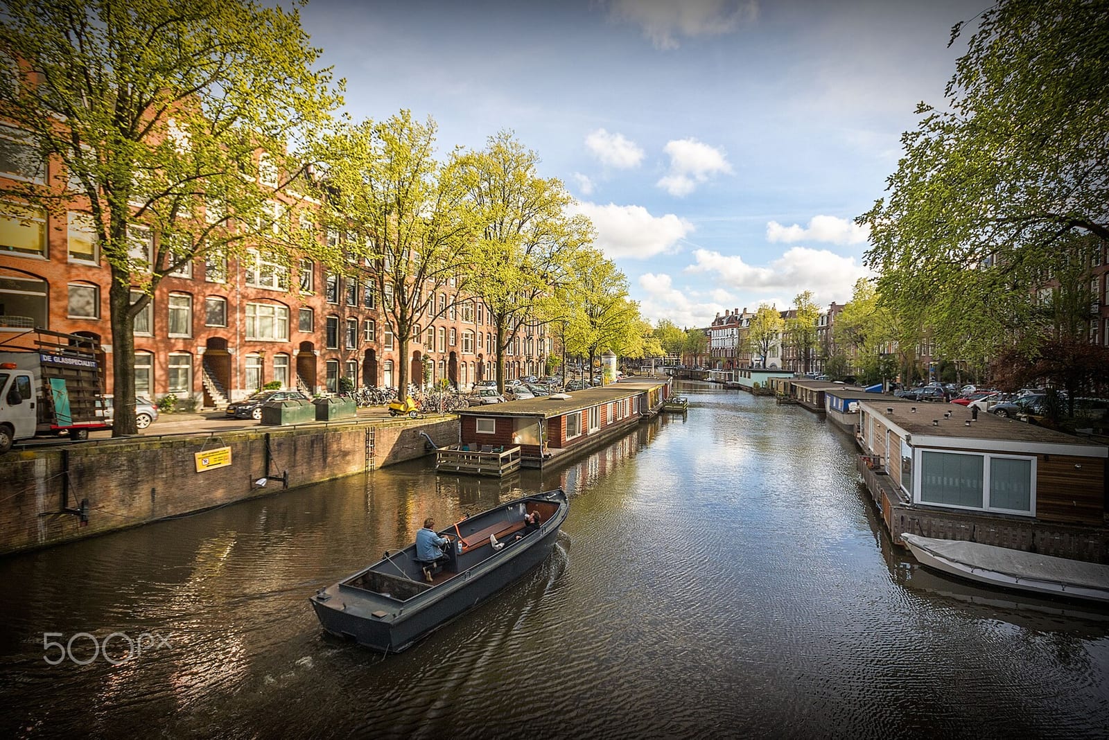 Amsterdam canal houses sunset