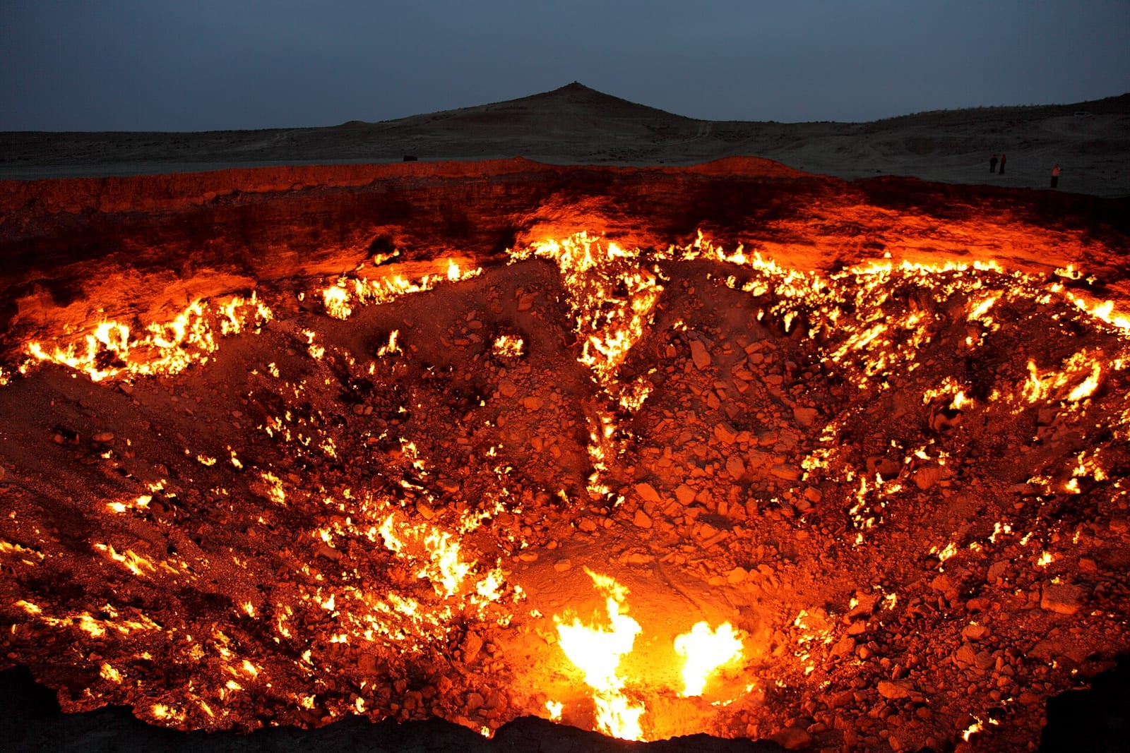 Darvaza gas crater night desert camp